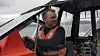 Vegard Evjen Hovstein, adm. dir. i Maritime Robotics, ved roret på selskapets UVS, som brukes til testing av autonomi. UVS står for Unmanned Surface Vessel, men under utprøving er det alltid en person om bord. Foto: Tore Stensvold