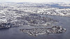 Turismeinntekter ryker fordi cruiseselskapene frykter nærheten til Russland. Her ser vi Kirkenes fra luften 9. mai 2022