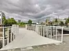 Det tok en halv times tid å heise broen på plass over kanalen i Malmö. Foto: Jan Kroon, Fiber Core