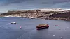 Under sjøsettingen ble Hurtigrutens nyeste skip hilst velkommen til sitt rette element av selskapets eldste: Nordgående hurtigruteskip, MS Lofoten fra 1964, som var på nordgående rute.