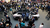 People gather around the Faraday Future's FF91 electric car at CES International Thursday, Jan. 5, 2017, in Las Vegas. (AP Photo/Jae C. Hong)