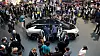 People gather around the Faraday Future's FF91 electric car at CES International Thursday, Jan. 5, 2017, in Las Vegas. (AP Photo/Jae C. Hong)