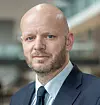 Det er høy risiko for krenkelse av menneskerettigheter med de inngrepene Øyfjellet vindpark medfører i Jillen-Njaarke reinbeitedistrikt, sier senioranalytiker Vemund Olsen i Storebrand. Foto: Storebrand
