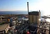 Inne i den gul-brune bygningen er sodakjelen - landets største biobrenselkjele. Her forbrennes brukt kokelut og det produseres 275 GWh i året.