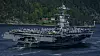 Det amerikanske hangarskipet USS Gerald R. Ford på vei inn Oslofjorden i mai. Nå skal flåten som inkluderer verdens største krigsskip, seile nærmere Israel.