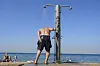 Det er meldt over 40 grader i Athen Hellas, der terrengbranner har herjet like i nærheten.