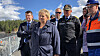 Statsminister Erna Solberg sammen med justis-, beredskaps- og innvandringsminister Tor Mikkel Wara, politidirektør Reidar Humlegård og Jonny Hermansen, prosjektleder i Skanska.