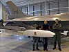 Morten Vangen (f.v) og Børre Løkenhagen fra Kongsberg Defence Systems og Jon A. Olsen fra Forsvarets logistikkorganisasjon i forbindelse med første prøveopphenging av JSM på et F-16 i forbindelse med forberedelsene til prøveflyging med missilet.