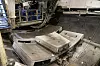Betongelementene som kler tunnelveggene fraktes inn til TBM-en med en spesialdesignet lastebil, for deretter å løftes av med kran og monteres ved hjelp av et løftesystem på TBM-en. Foto: Eirik Helland Urke